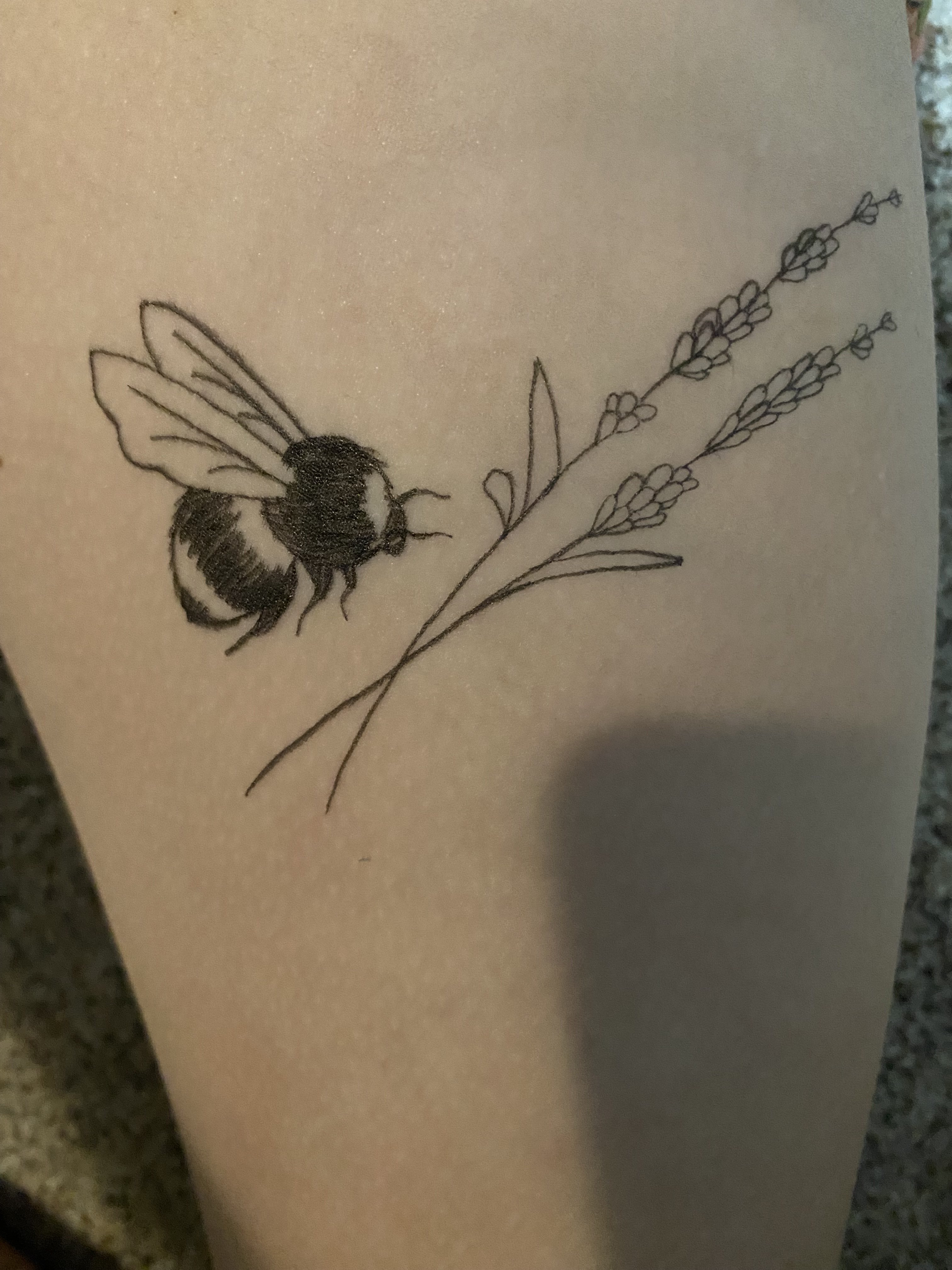 a bee and a lavendar sprig