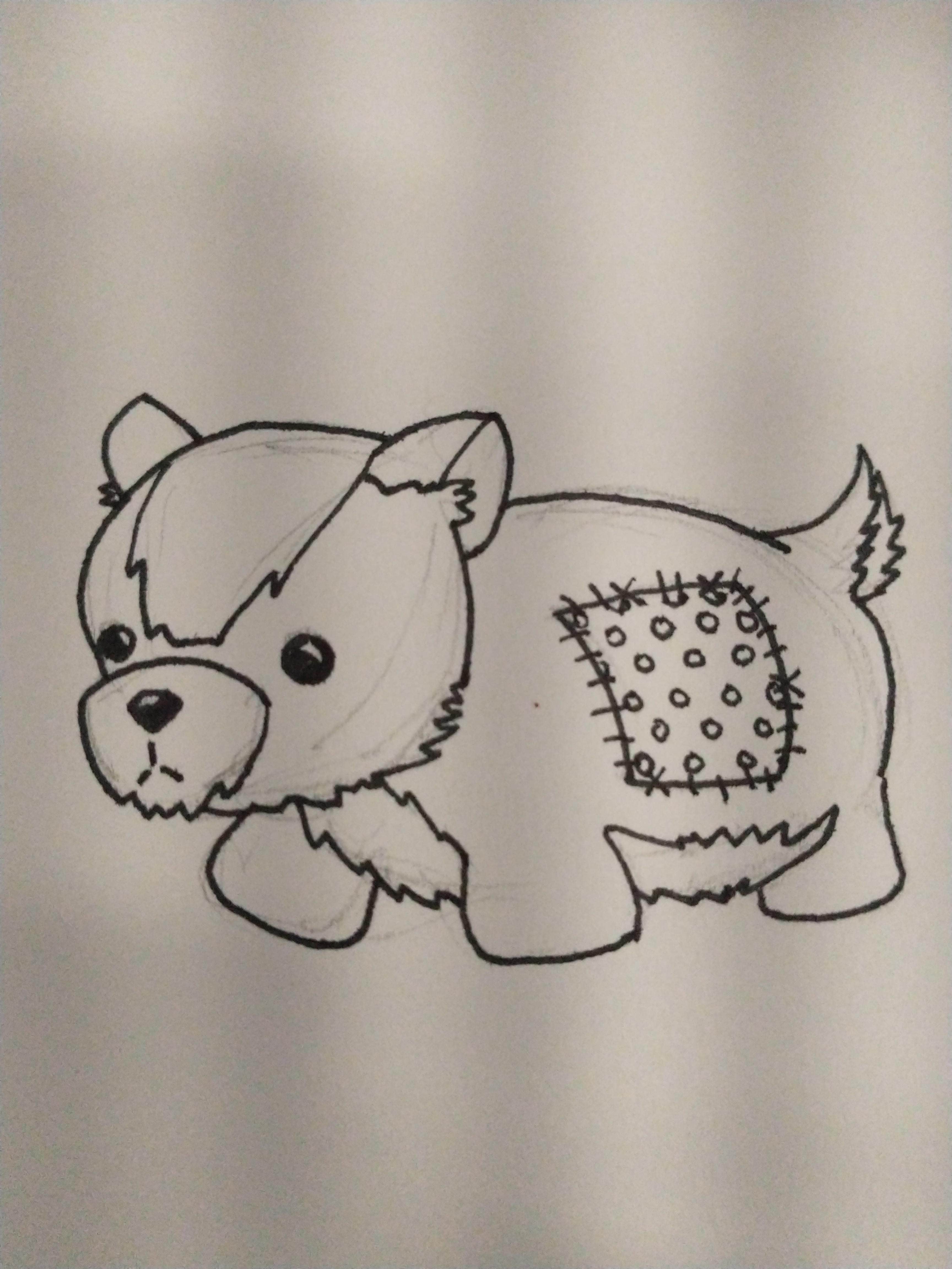 a patchwork stuffed dog